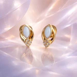 Signed Avon 1980s White Faux Opal Stud Earrings with Rhinestone Details